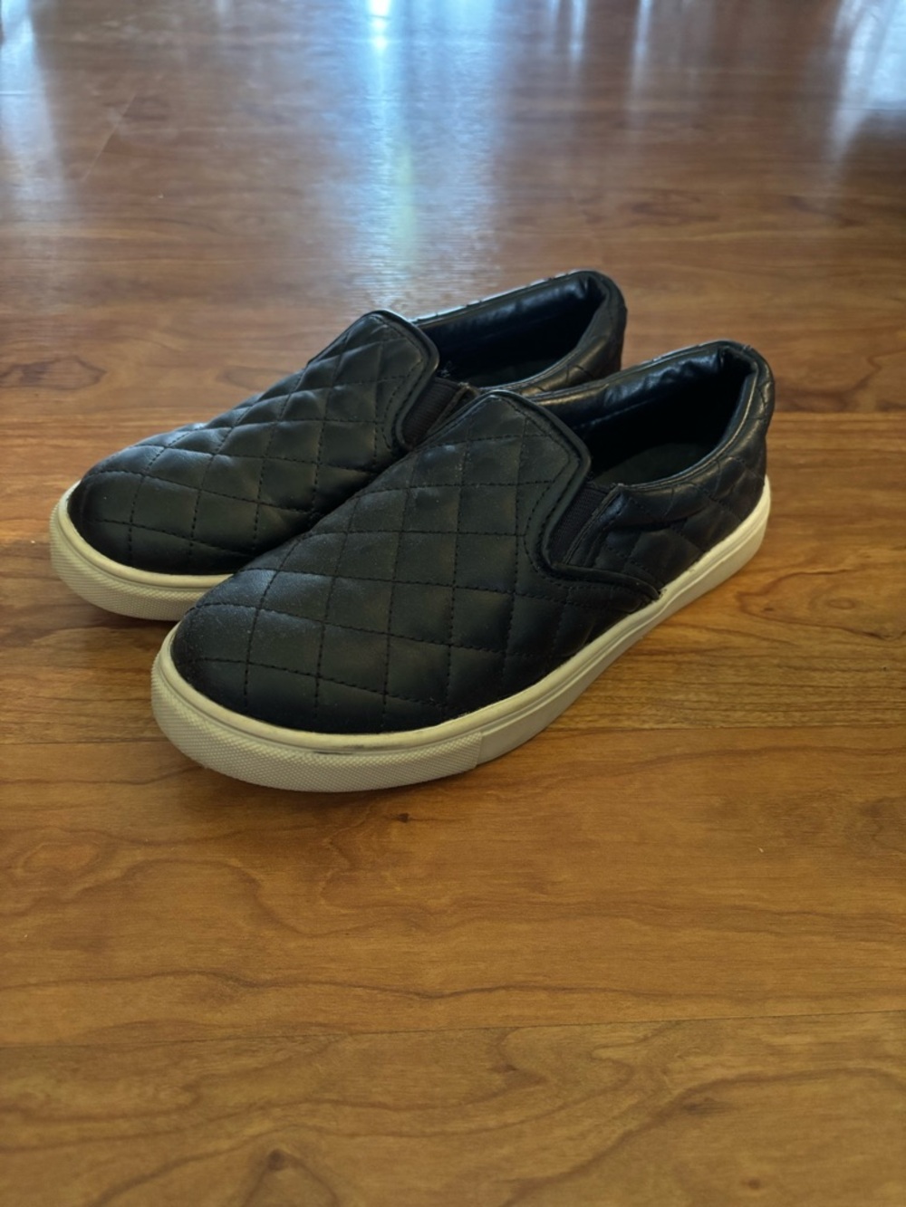 Steve Madden Quilted Slip-On Sneakers in Black with White Sole